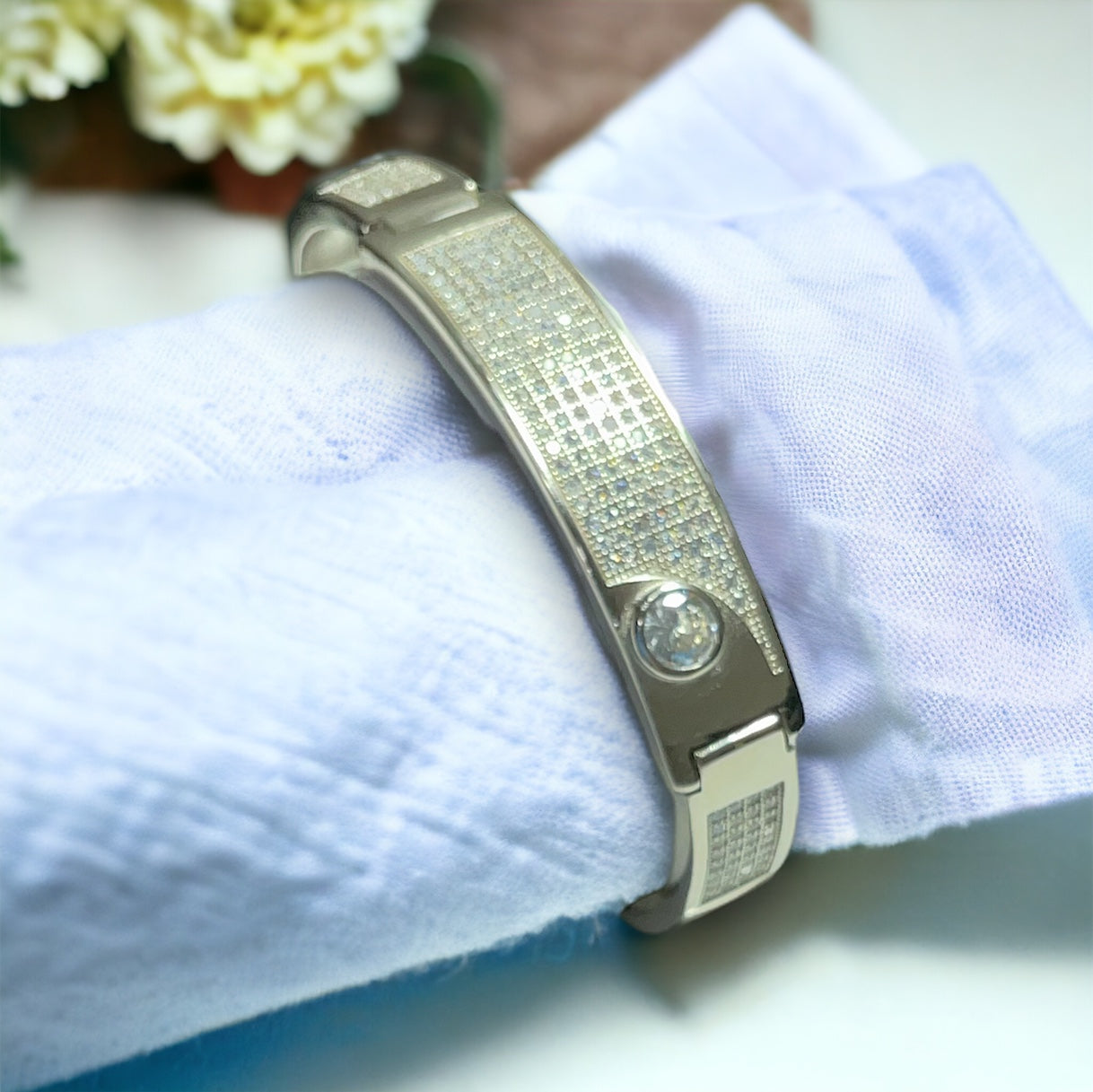 a close up of a bracelet on a person's wrist