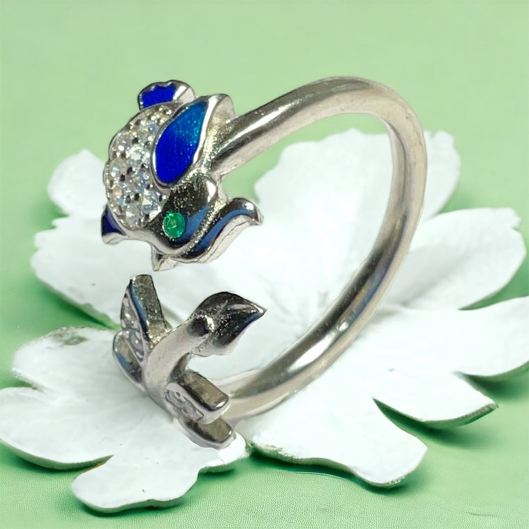 a close up of a ring on a flower