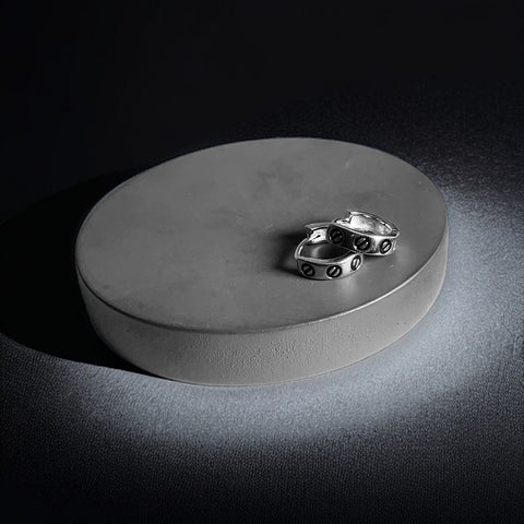 a silver object sitting on top of a table
