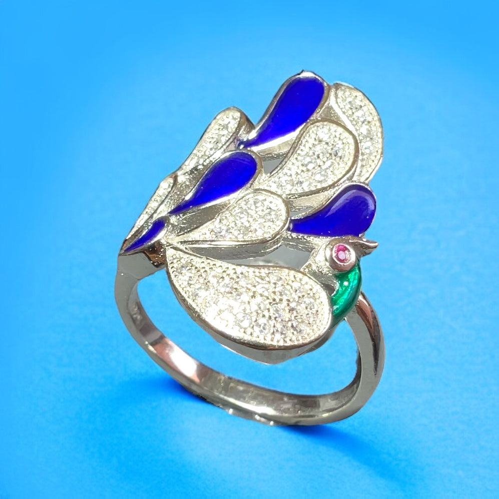 a close up of a ring on a blue background