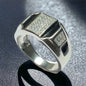 a white gold ring with diamonds on it