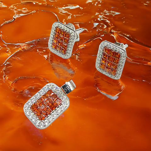 three square shaped orange and white diamond earrings