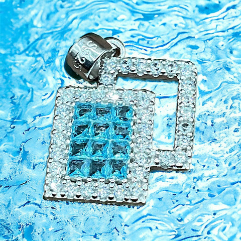 a square shaped blue and white diamond pendant