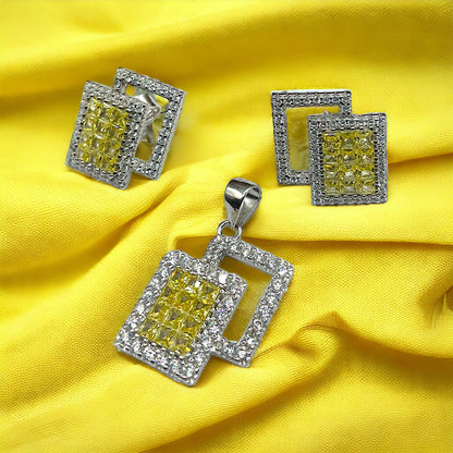 a pair of yellow and white diamond earrings