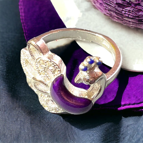 a ring with a crown on top of it