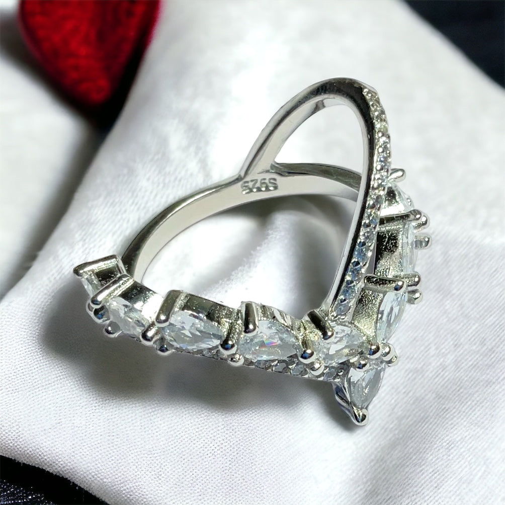 a close up of a ring on a napkin