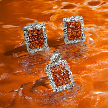 a pair of orange and white diamond earrings