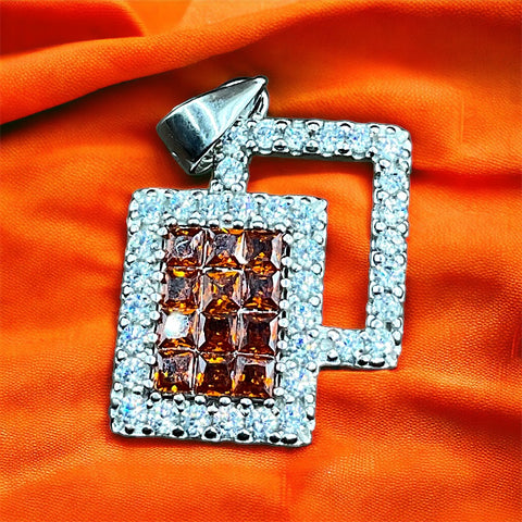 a square shaped pendant with a lot of diamonds on it