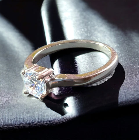 a close up of a ring on a cloth