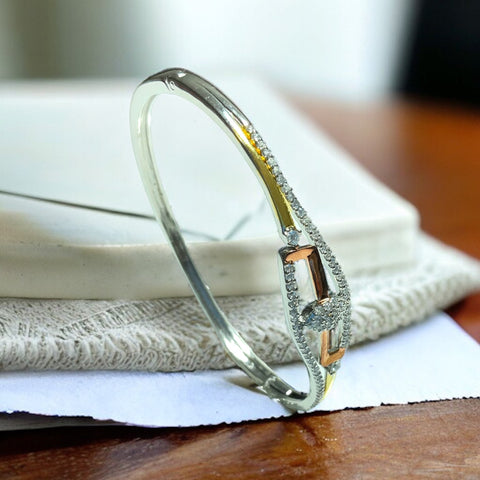 a close up of a bracelet on a napkin on a table