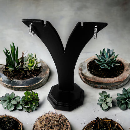 a table topped with lots of potted plants