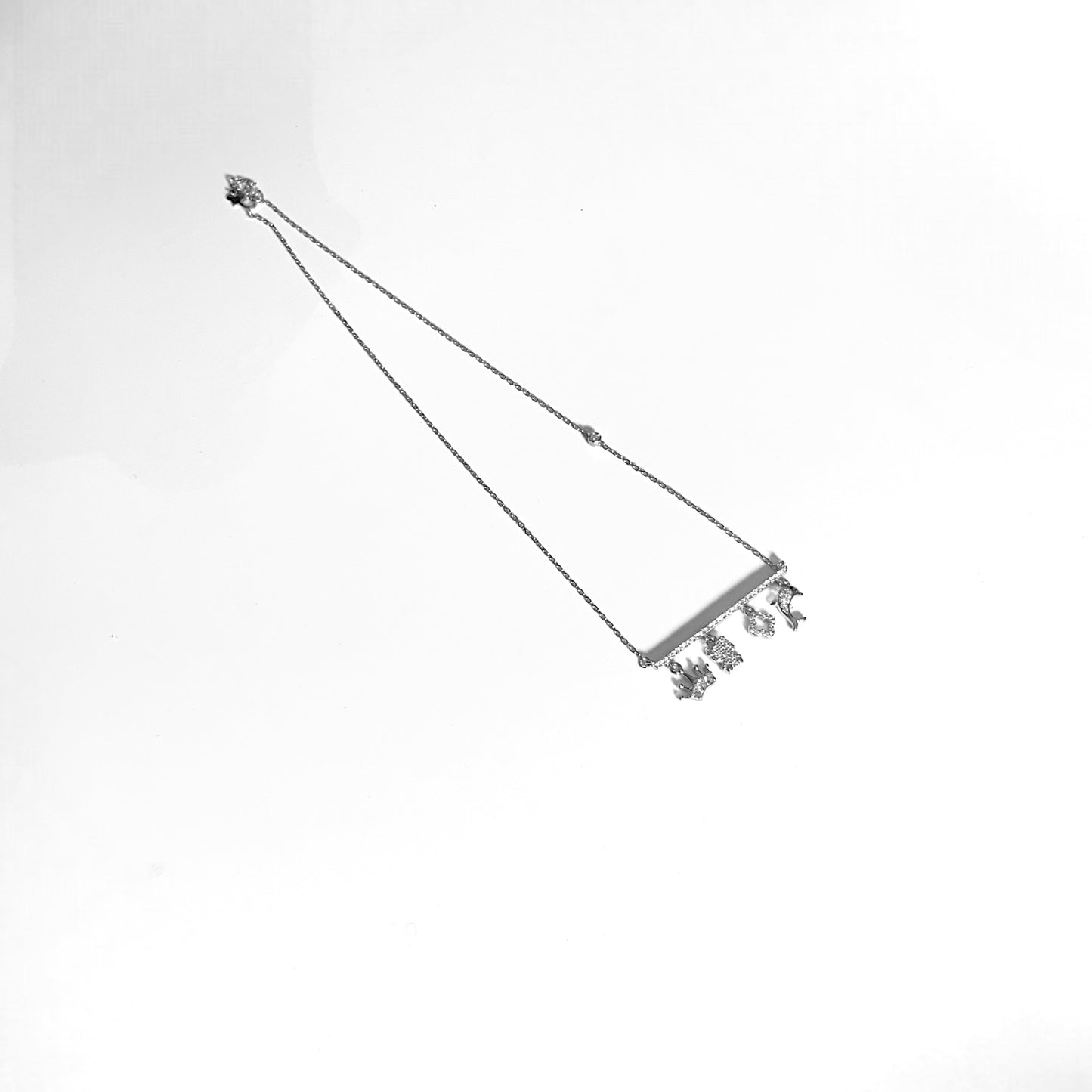 a black and white photo of a kite in the sky