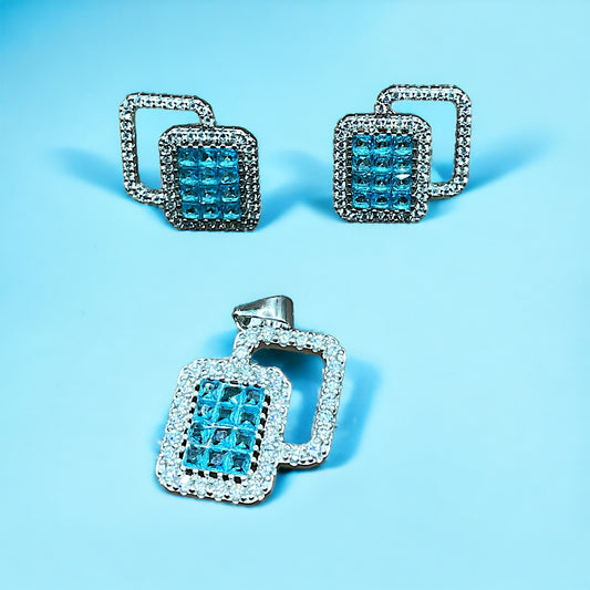 a pair of blue and white diamond earrings