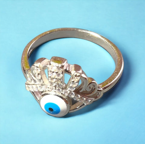 a close up of a ring with an evil eye