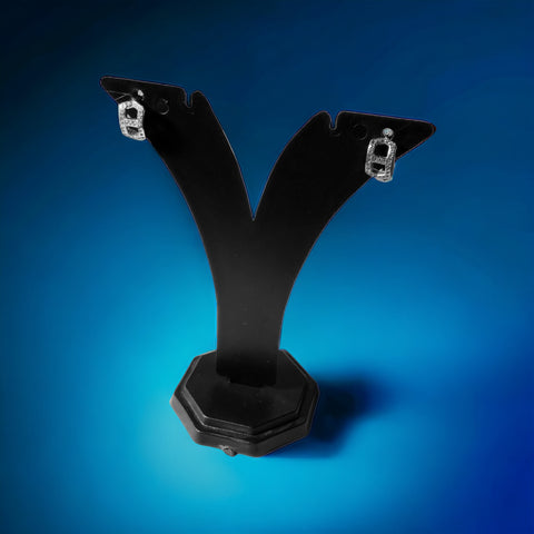a pair of black metal brackets on a blue background