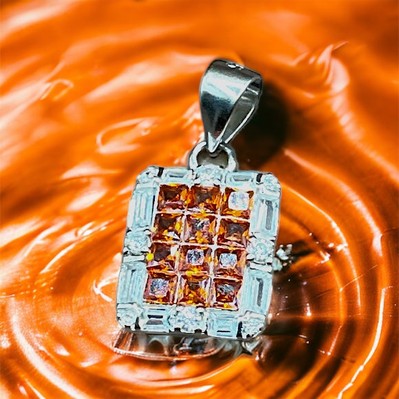 a pendant with a square design on it
