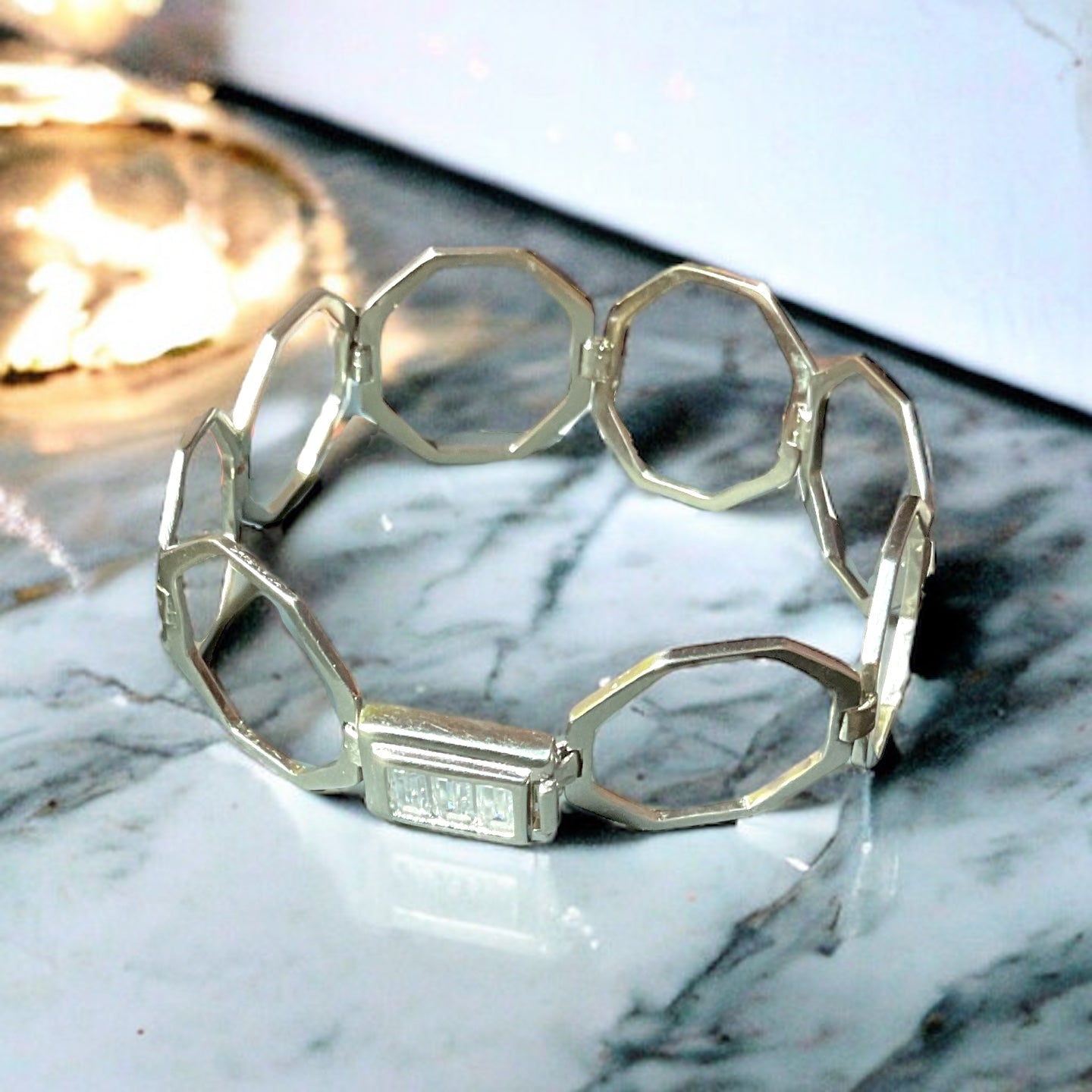 a close up of a bracelet on a table