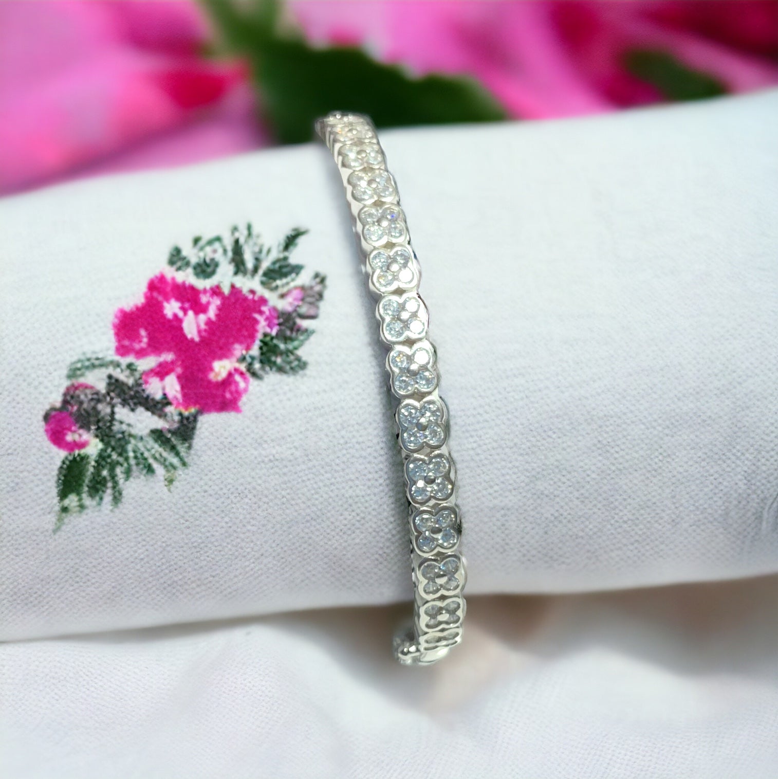 a close up of a bracelet on a napkin