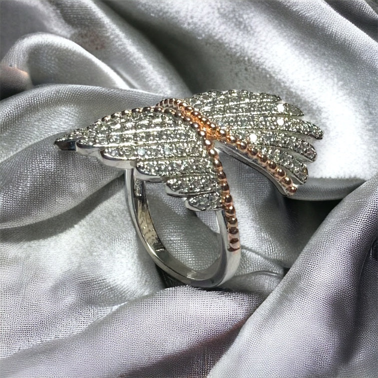 a diamond ring on a satin fabric