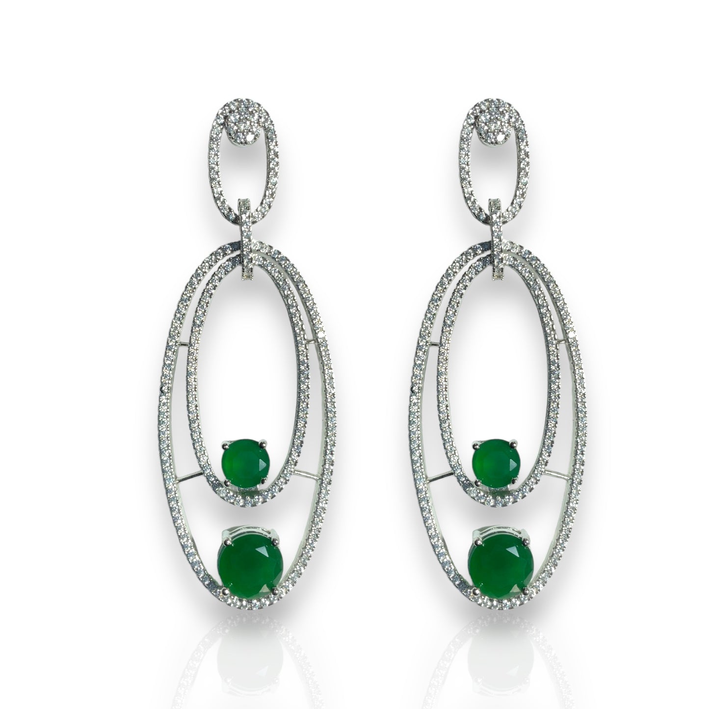 a pair of emerald and diamond earrings