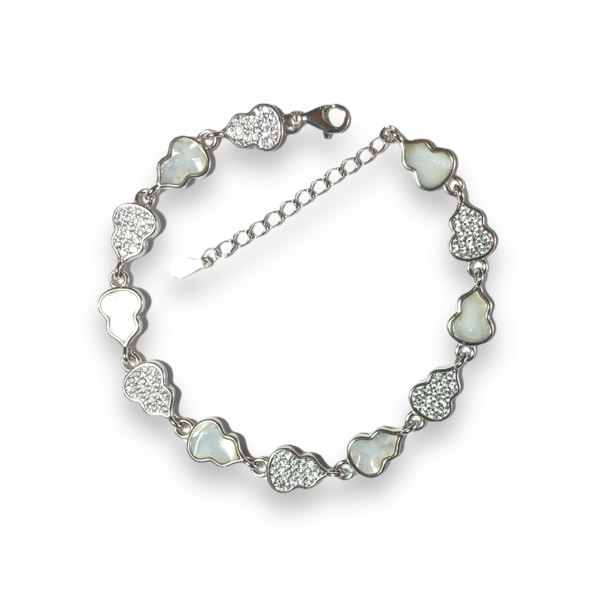 a bracelet with hearts and crystals on a white background