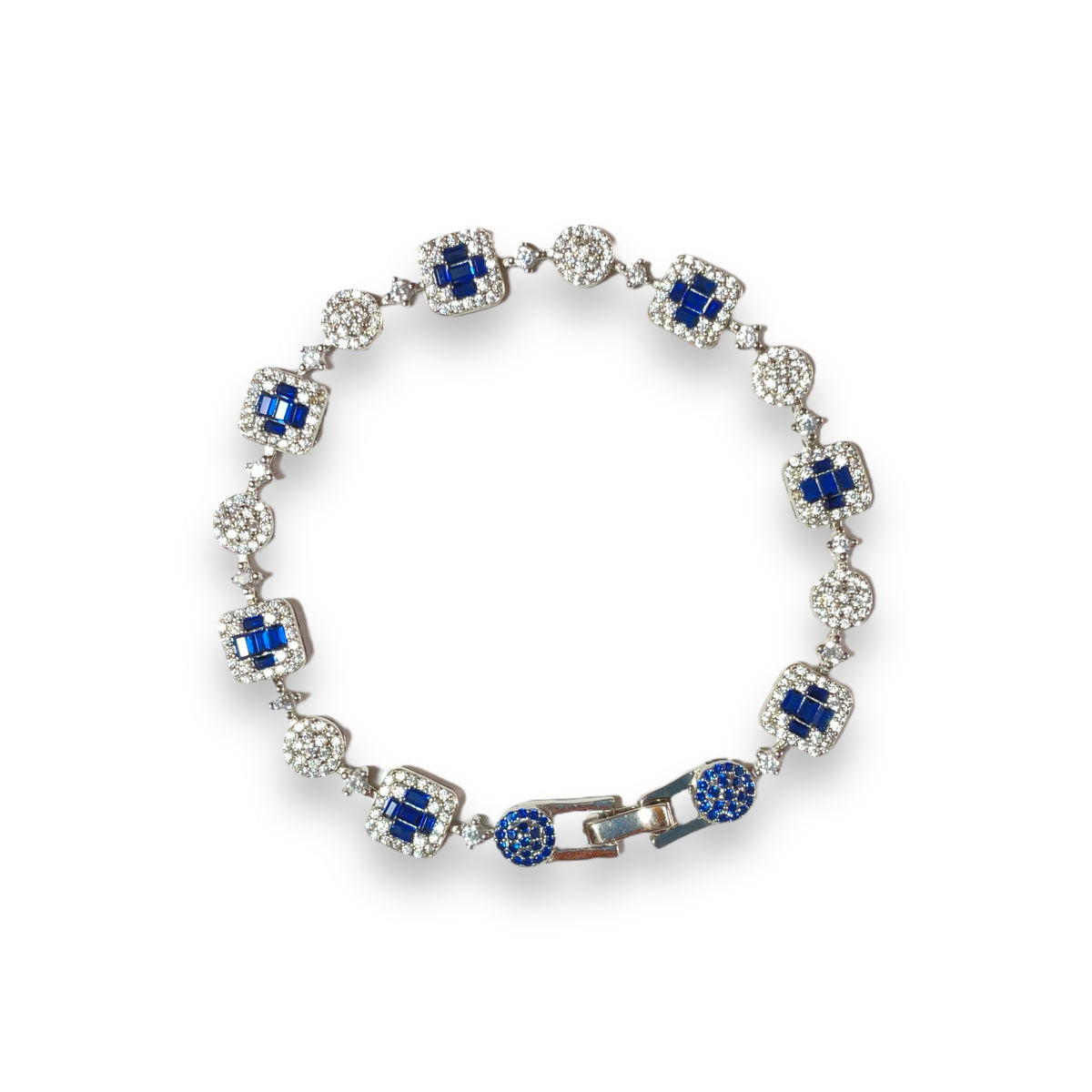 a blue and white bracelet on a white background