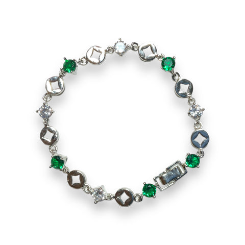 a bracelet with green and white stones on a white background