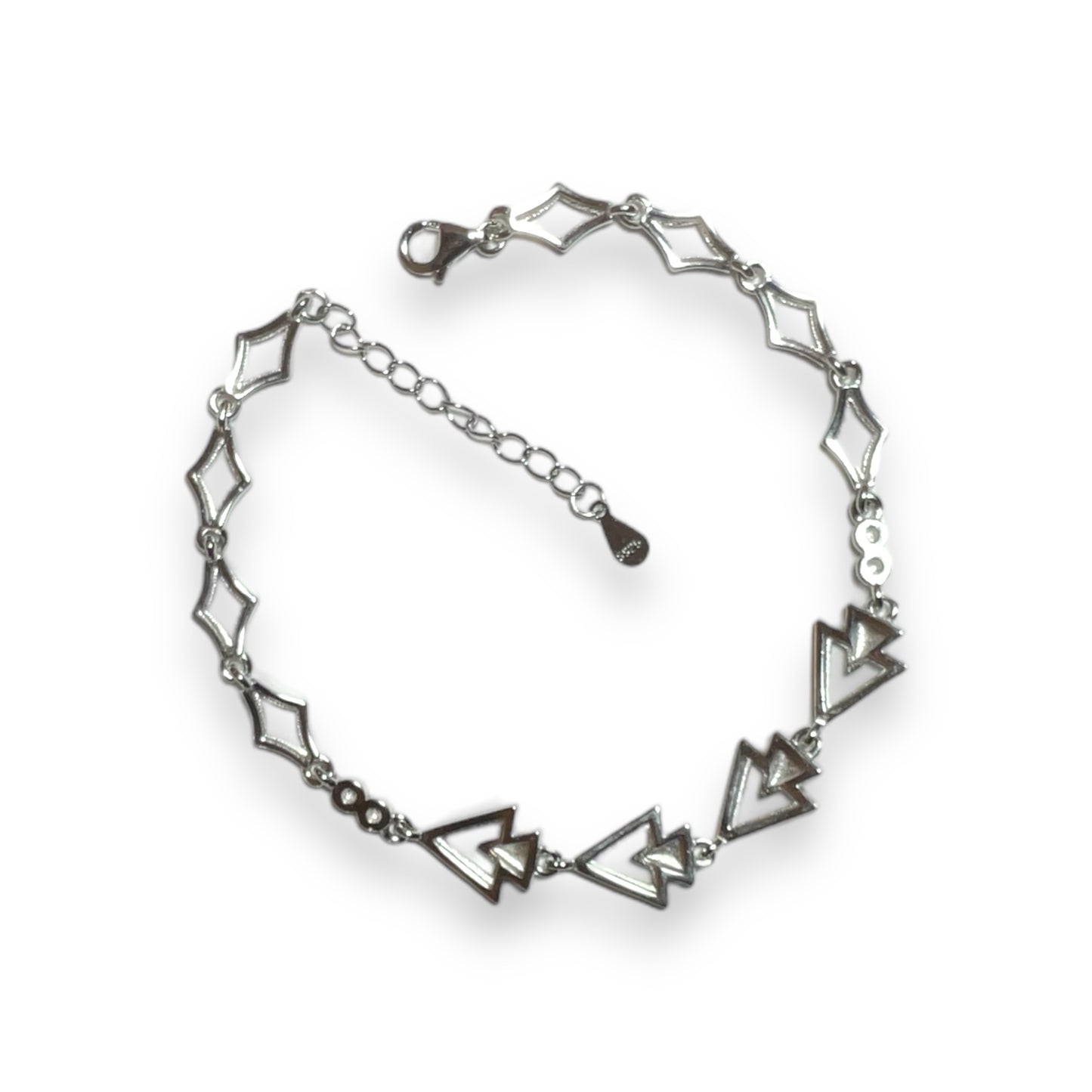 a silver bracelet with an arrow design on it