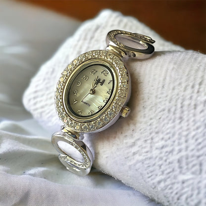 a close up of a watch on a person's hand