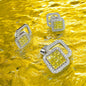 three square shaped yellow and white diamond rings