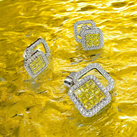 three square shaped yellow and white diamond rings